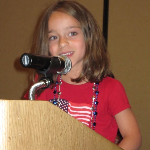 Girl at Podium