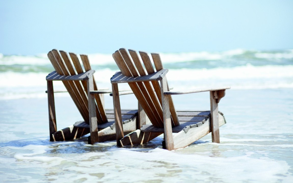 Chairs in the surf